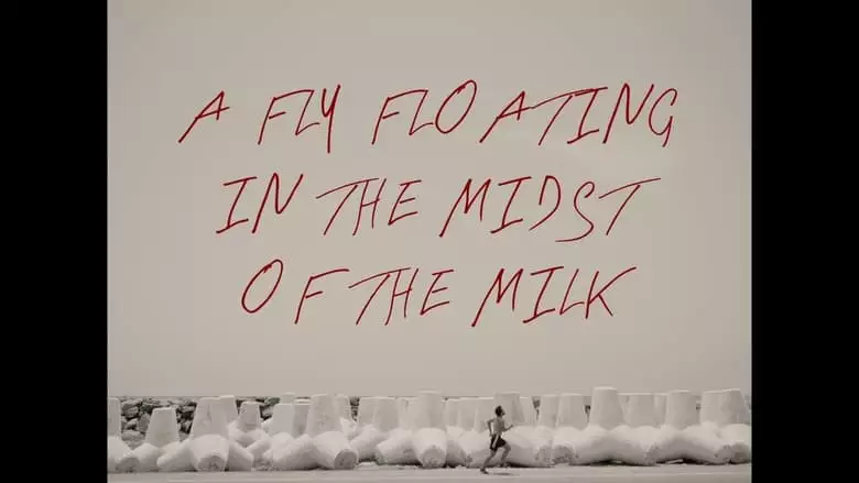 A Fly Floating In The Midst Of The Milk (2023)