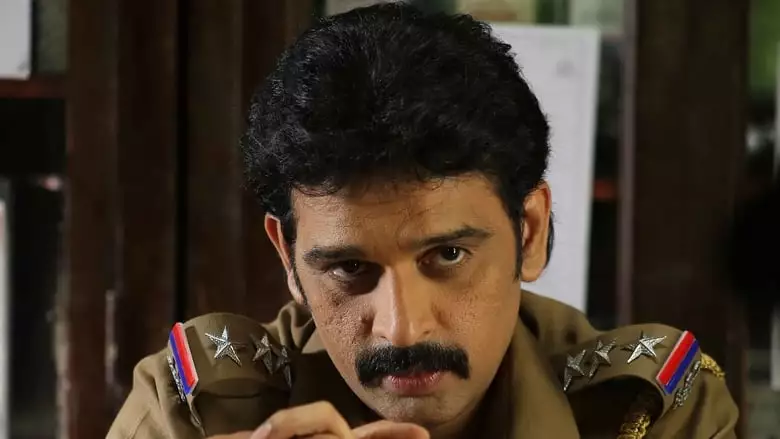 Marainthirunthu Paarkum Marmam Enna (2018)